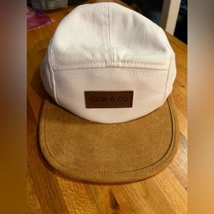 Cash and Co. SnapBack child hat. Size S/M. Great condition. White and tan.